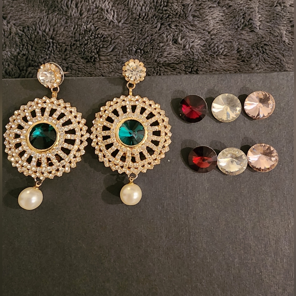 Golden earrings with 4 changeable stones.red green pink and white.
